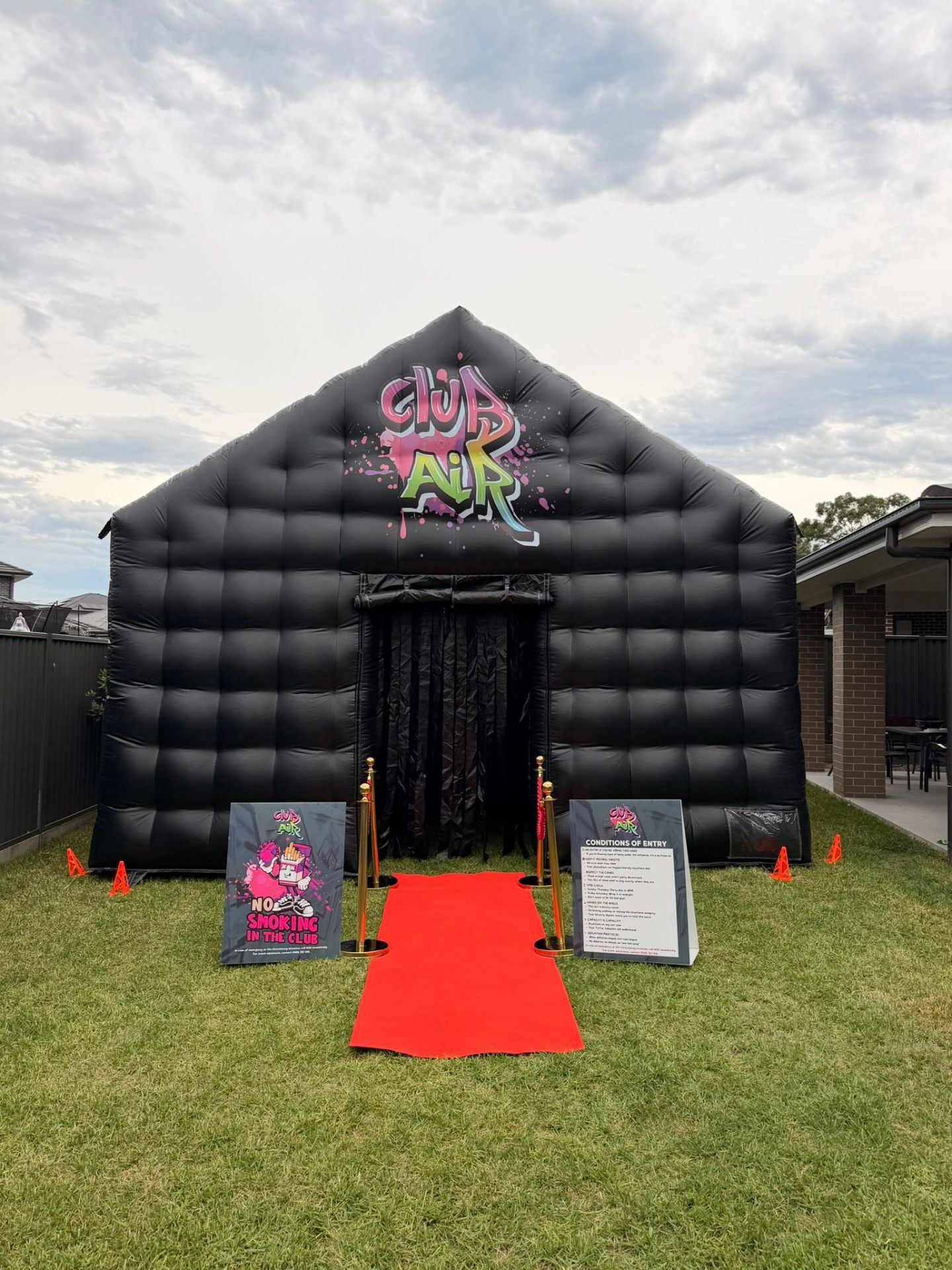Red carpet entrance to the inflatable disco